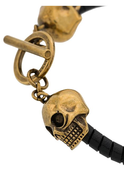 Man Black And Golden Skull Bracelet With T-Bar Closure ALEXANDER MCQUEEN | 554600-J127G1000