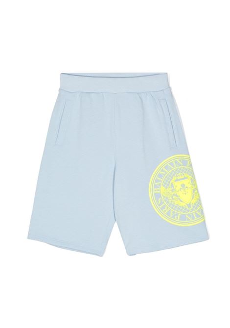 Light Blue Sports Bermuda Shorts With Rubberized Logo BALMAIN KIDS | BU6S39-Z1753652GL